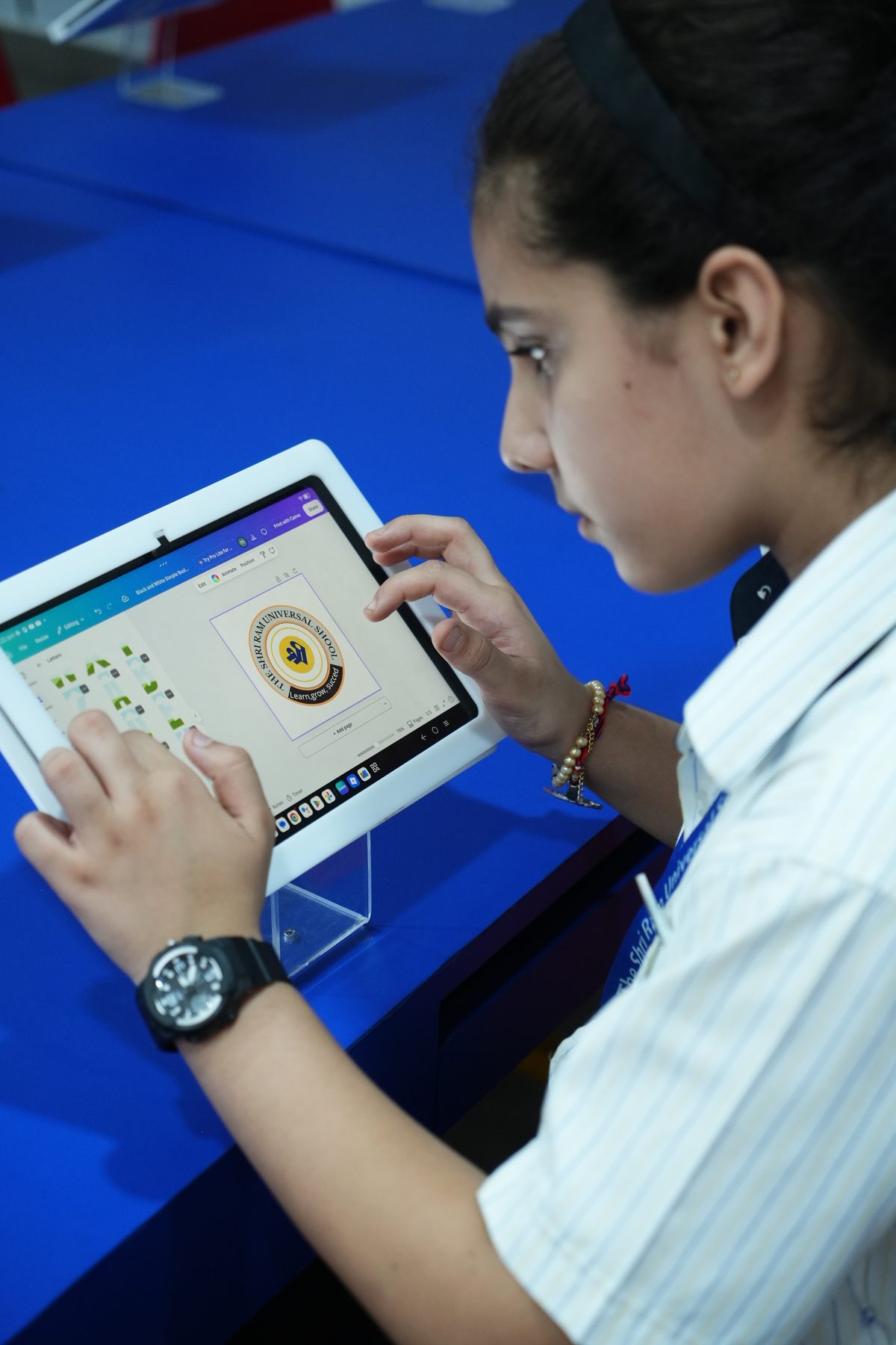 A student at TSUS Sarabha Nagar works on a design task on a tablet in the Digital Skill Lab
